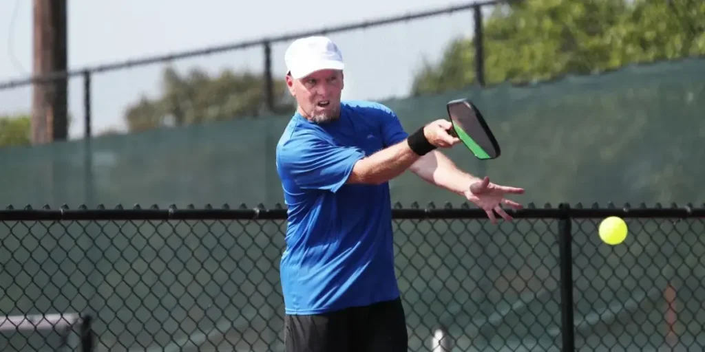 Can you hit a pickleball with your hand